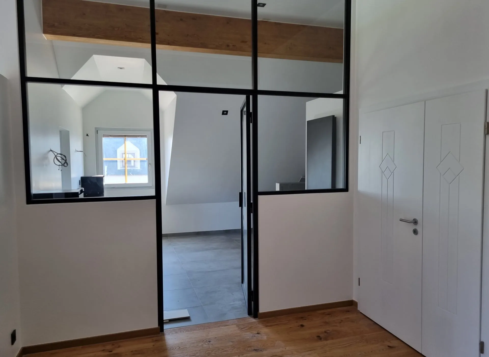 Chambre suite parentale rénovée à Schieren par BauArt, photo 6